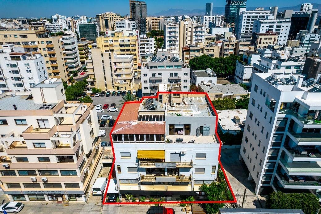 Four storey mixed-use building in Agioi Omologites, Nicosia photo 7